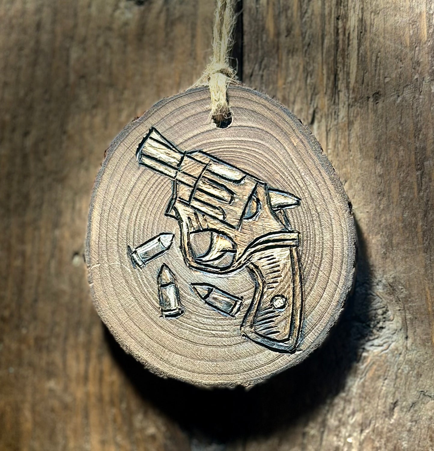 The Pew Pew Woodslice Ornament or Gift Tag with a hand Burned Gun and Bullets